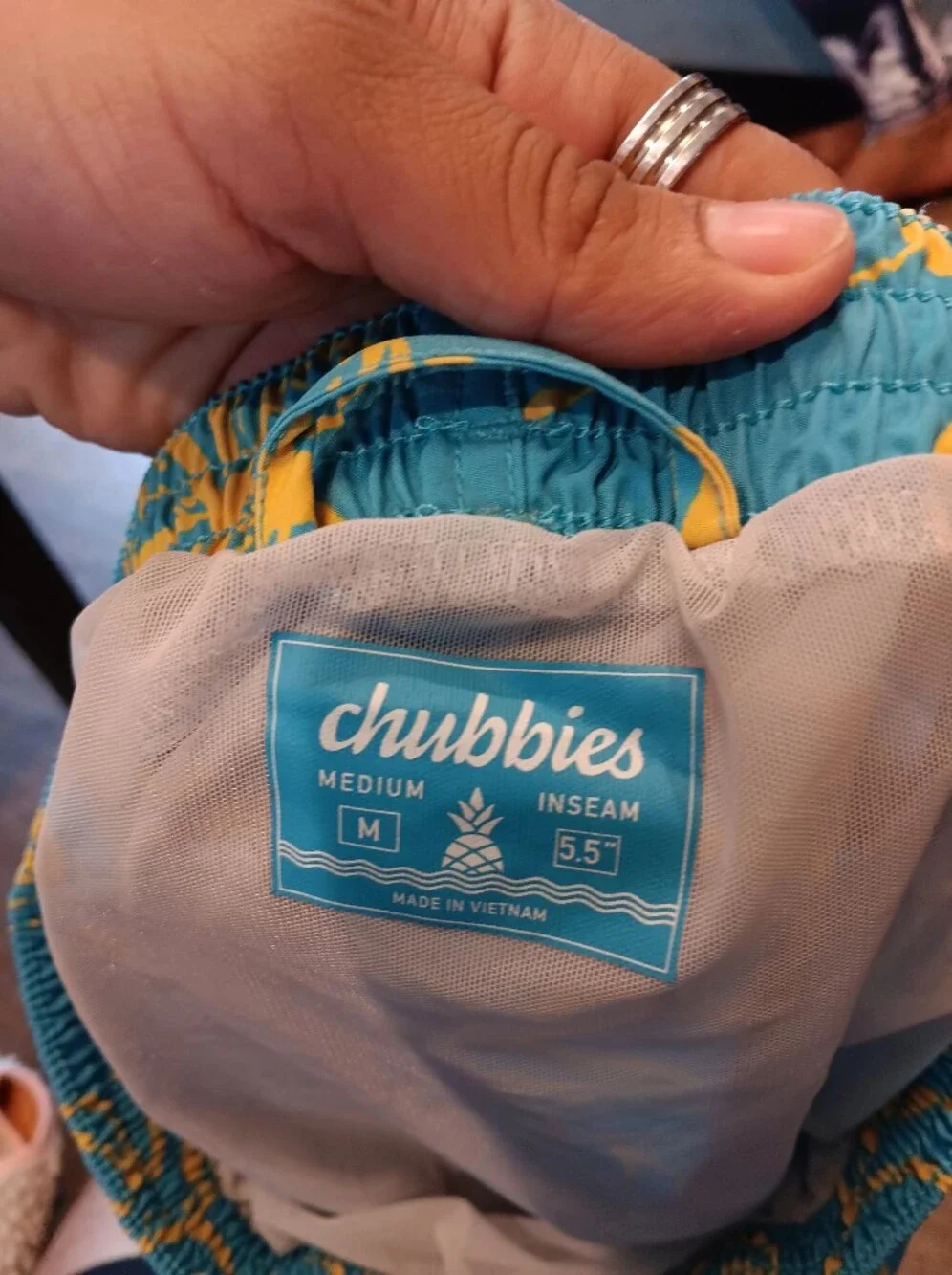chubbies Turquoise Swim Trunks with Yellow Tropical Print